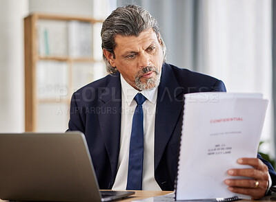 Buy stock photo Lawyer, confidential and paperwork with man reading patient file and documents in office. Compliance, legal report and attorney employee in a law firm with government contract and policy planning