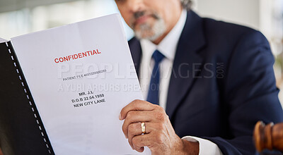 Buy stock photo Lawyer, confidential and paperwork with hands holding patient file and documents in office. Compliance, legal report and attorney employee in a law firm with government contract and policy reading