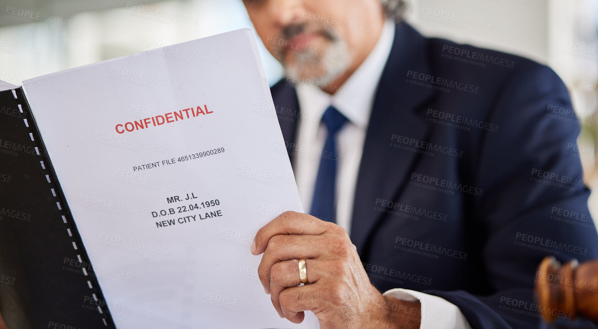 Buy stock photo Lawyer, confidential and paperwork with hands holding patient file and documents in office. Compliance, legal report and attorney employee in a law firm with government contract and policy reading