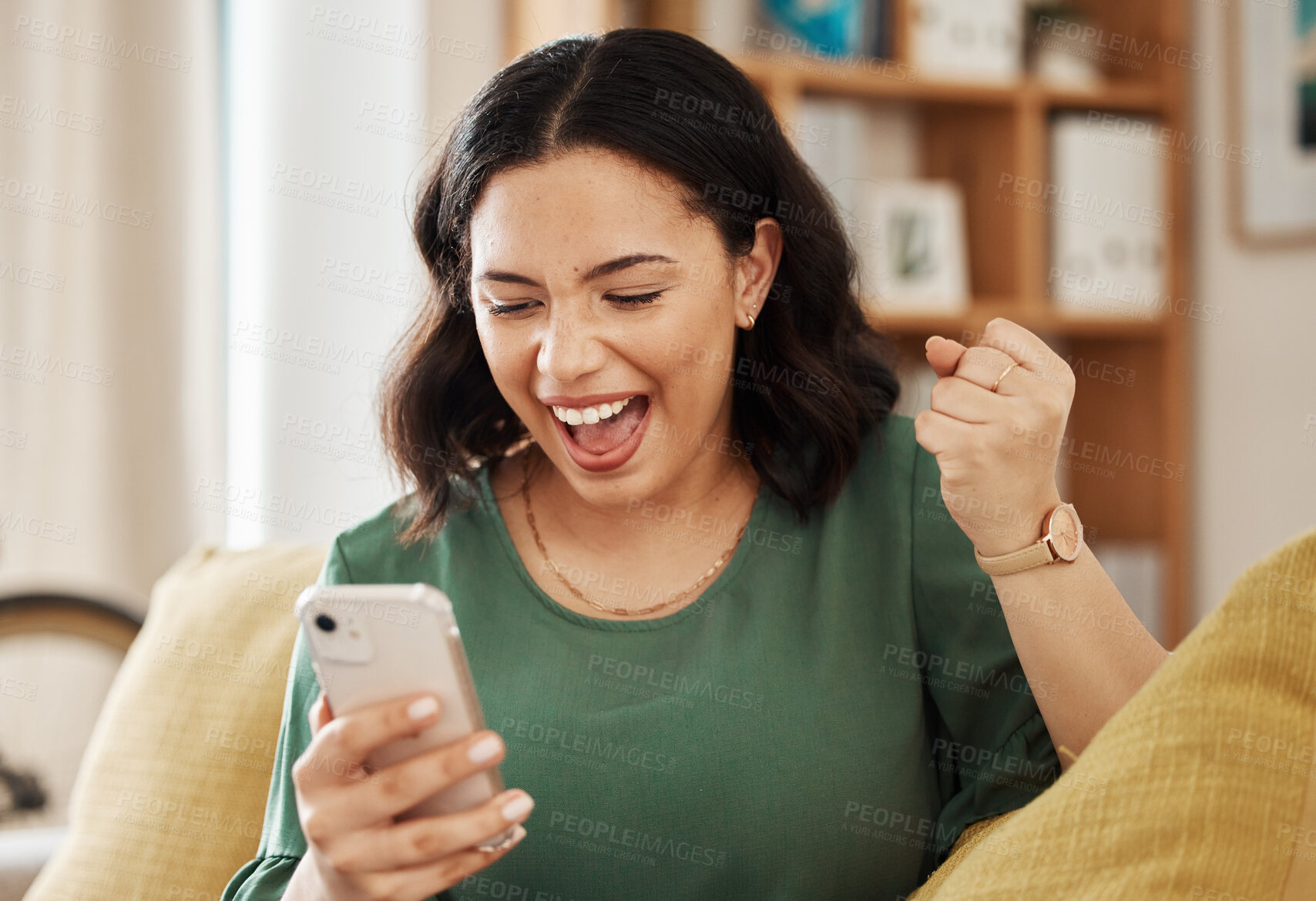 Buy stock photo Phone, winning and celebrate, happy woman on sofa with notification on bonus, deal or discount offer online. Win, social media and girl on couch with smile, cellphone and excited for surprise in home