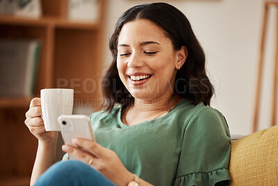 Buy stock photo Happy woman on sofa with phone, coffee and relax, reading email or social media meme in living room. Networking, cellphone and happiness, girl in home with smile, chat and internet search for post.