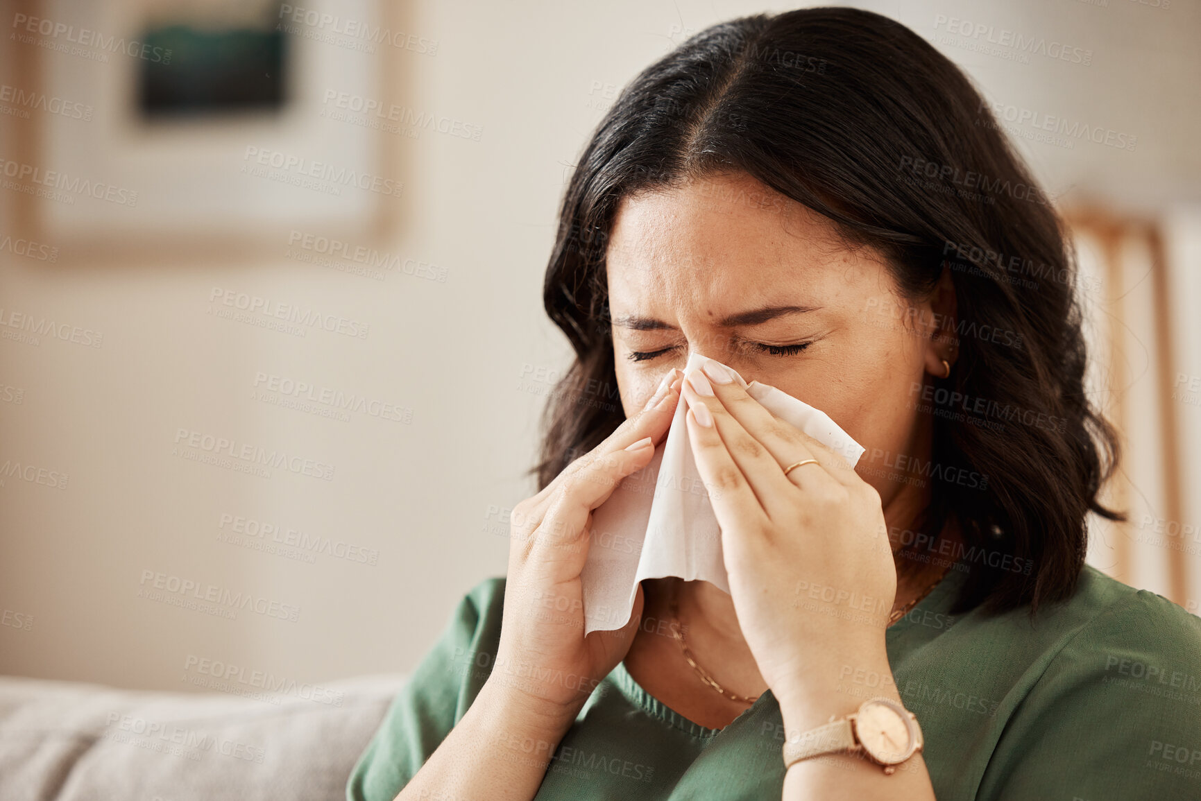 Buy stock photo Tissue, blowing nose and woman in a living room with flu, cold and hay fever, crisis or viral infection in her home. Sneezing, allergies and person with health risk in a lounge or coughing illness