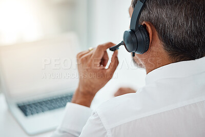 Buy stock photo Back, call center and man listening for customer service, support and business with laptop. Contact us, telemarketing microphone and professional, sales agent and crm consultant working at help desk