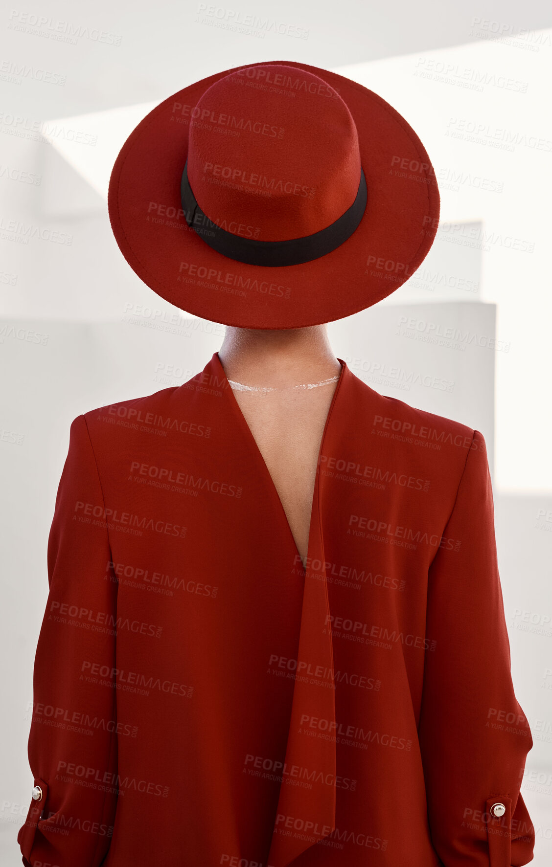 Buy stock photo Vintage, fashion and person with red hat and white background in studio for creative, designer and retro clothing. Mystery, couture model and person in a suit with beauty, aesthetic or character