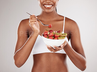 Buy stock photo Woman, hands and diet with fruit salad for natural nutrition against a white studio background. Closeup of female person holding bowl of organic strawberry and kiwi to lose weight or healthy wellness