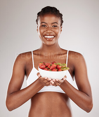 Buy stock photo Healthy, portrait and black woman with fruit on a studio background for a diet to lose weight. Happy, wellness and an African model or girl with breakfast food, morning nutrition or eating for detox