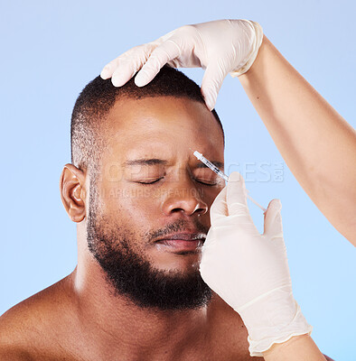 Black man, plastic surgery and syringe in studio for beauty, anti-aging or facial transformation by background. African patient, model and medic hands for dermatology, needle or fillers for aesthetic