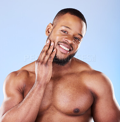 Buy stock photo Skincare, portrait of black man with hand on face, studio and luxury skin care morning routine. Dermatology, spa cosmetics and facial beauty glow for wellness, happy model isolated on blue background