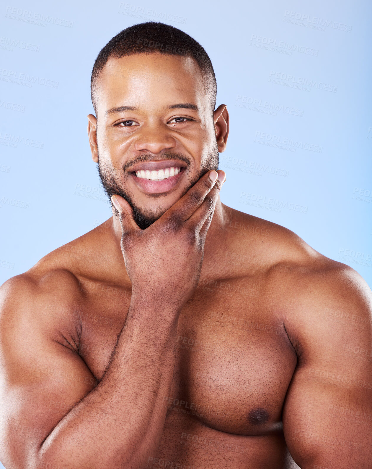 Buy stock photo Skincare, portrait of black man with hand on face, studio and luxury skin care morning routine. Dermatology, spa cosmetics and facial beauty glow for wellness, happy model isolated on blue background