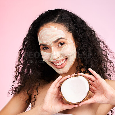 Buy stock photo Beauty, facial mask and portrait of woman with coconut for wellness, skincare and cosmetics on pink background. Dermatology, fruit and female person for organic detox, natural face and glow in studio