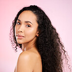 Beauty, portrait and skincare with african woman for glow with dermatology on body and pink background. Facial treatment, haircare and black girl with a natural face in studio for luxury treatment.