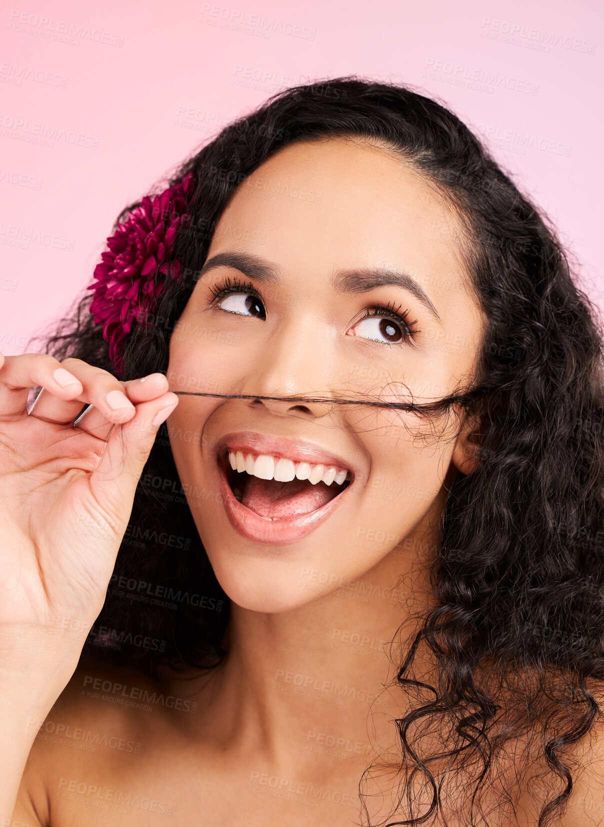 Buy stock photo Hair care, wellness and young woman in a studio with natural, beautiful and long curls. Happy, smile and female model from Mexico with a shiny salon treatment hairstyle isolated by a pink background.