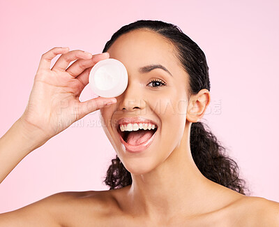 Buy stock photo Face, skincare and excited woman with cream container in studio isolated on a pink background. Portrait, natural and happy model with lotion, sunscreen cosmetic and dermatology product for wellness