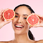 Face, grapefruit and beauty portrait of a woman with skin care, dermatology and natural glow. Happy young female aesthetic model with fruit for vitamin c, cosmetics or diet nutrition for detox
