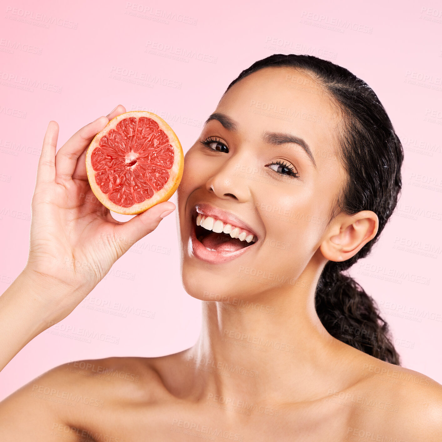 Buy stock photo Grapefruit, beauty and face of happy woman with skin care, dermatology or natural glow. Portrait of a female model with fruit for vitamin c, cosmetics or healthy diet for detox on studio background