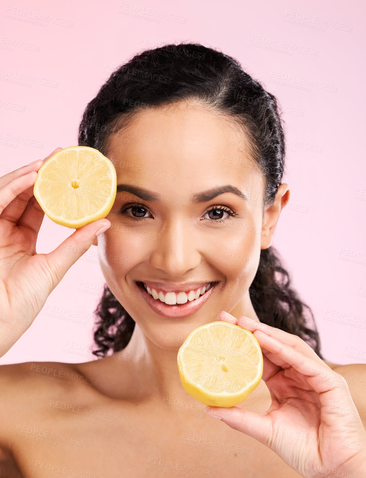 Buy stock photo Woman, skincare and lemon in studio portrait for smile, happiness or natural skin glow by pink background. Mexican model and fruit for cosmetics, youth or detox for wellness, nutrition and shine