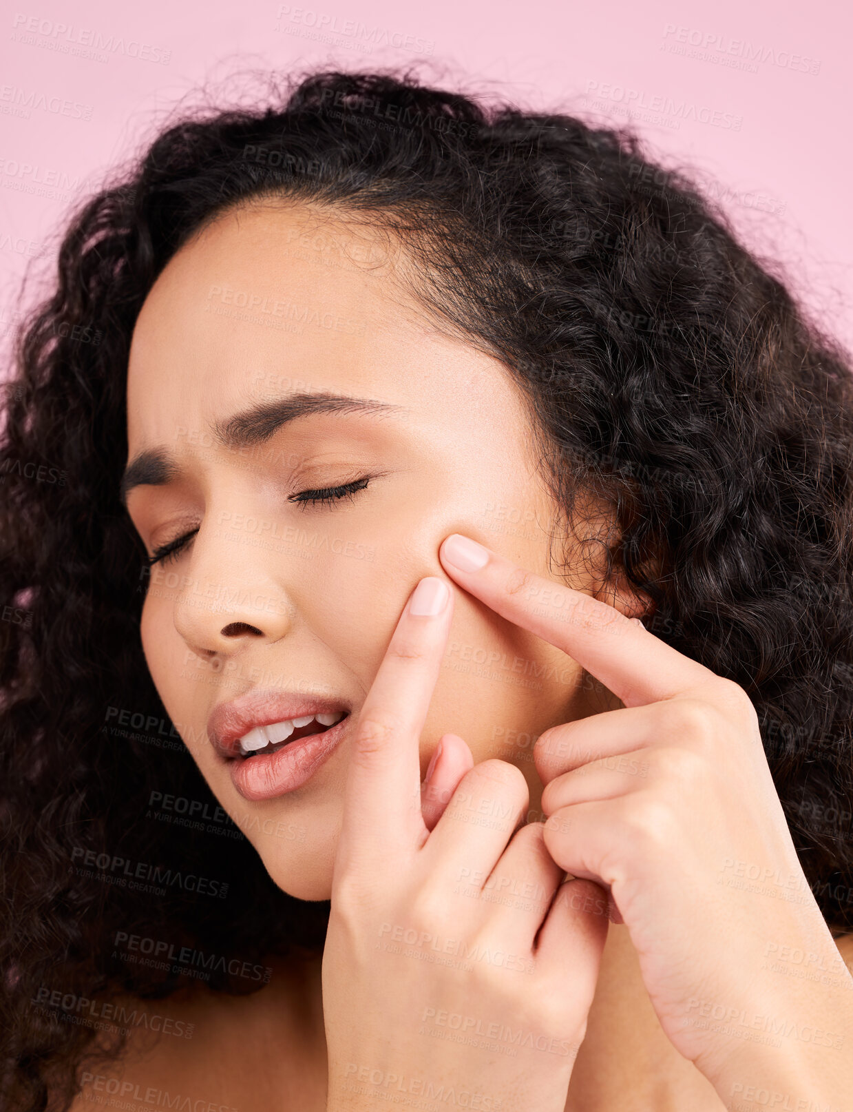 Buy stock photo Skincare, woman and acne or squeeze pimple with beauty in pink or studio background for self care. Natural, face and girl with blackhead or dermatology problem with cosmetic or facial treatment.