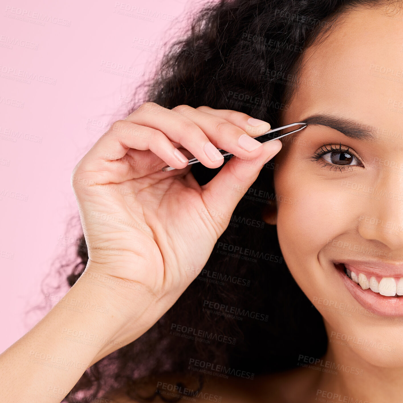 Buy stock photo Face, happy and woman with tweezer for eyebrow, beauty and grooming isolated on a pink background in studio. Natural portrait, facial plucking and hair removal of model for wellness and aesthetic