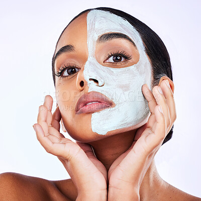 Buy stock photo Portrait, face mask and woman in studio skincare, half and cosmetic treatment on grey background. Facial, hands and female wellness model with cream, comparison or result, beauty and satisfaction