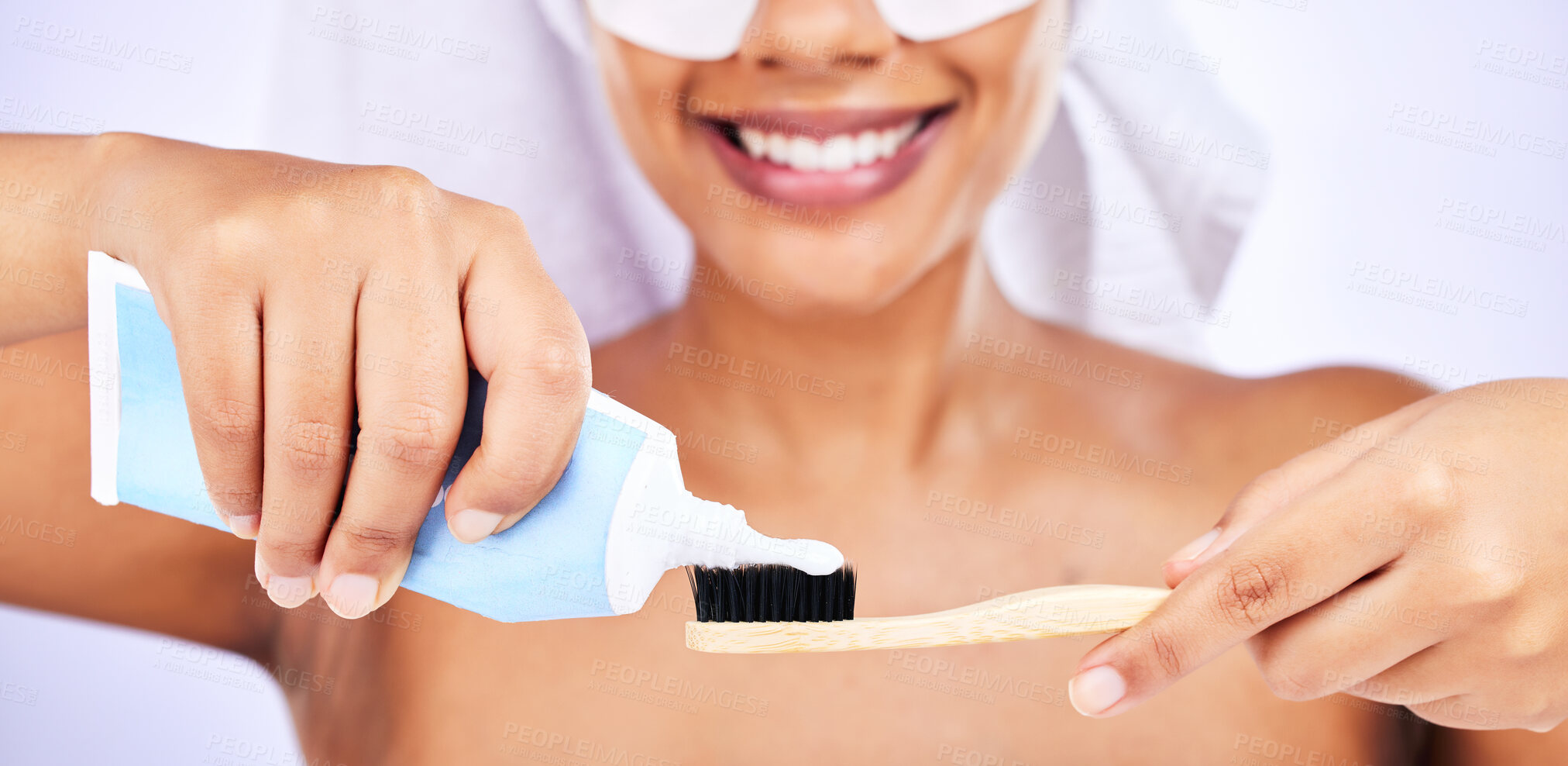 Buy stock photo Toothpaste, toothbrush and woman with an oral care routine in a studio for health and wellness. Smile, dental hygiene and closeup of female model getting ready to brush her teeth by white background.