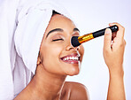 Smile, beauty and Indian woman with makeup brush in studio for glamour, cosmetic or application on grey background. Happy, tools and female model with nose, powder or contour, self love or results