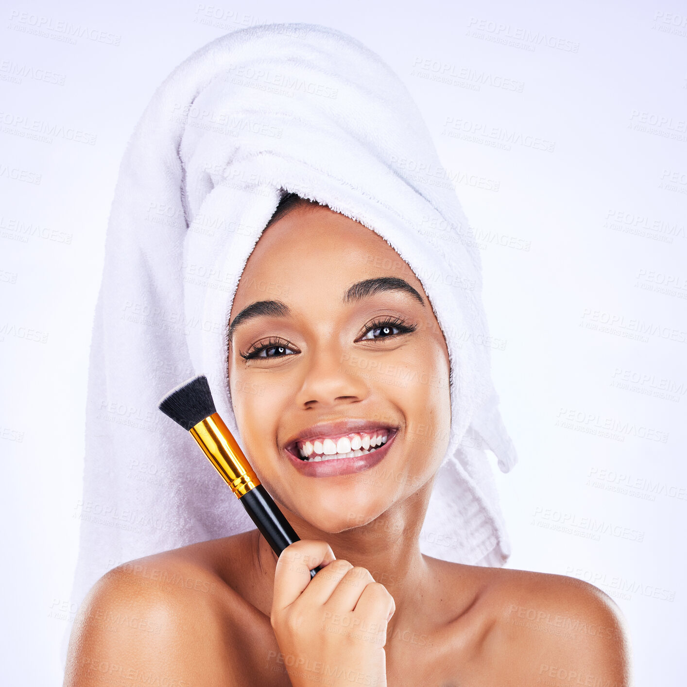 Buy stock photo Makeup, portrait and happy woman with brush in studio for application, contour or cosmetic on white background. Face, smile and wellness model for beauty, cosmetology or tool after shower routine