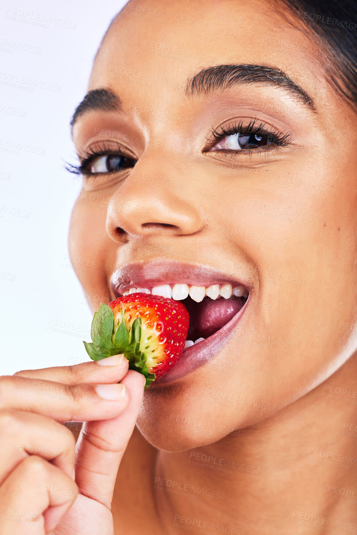 Buy stock photo Portrait, strawberry and Indian woman in studio for health, diet and detox, nutrition and wellness. Fruit, berry and face of lady with natural, vegan or organic snack for weight loss and antioxidants