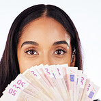 Portrait, cash and a woman lottery winner in studio on a gray background in celebration of a bonus or promotion. Eyes, money and finance payment with a happy young female person holding euro notes