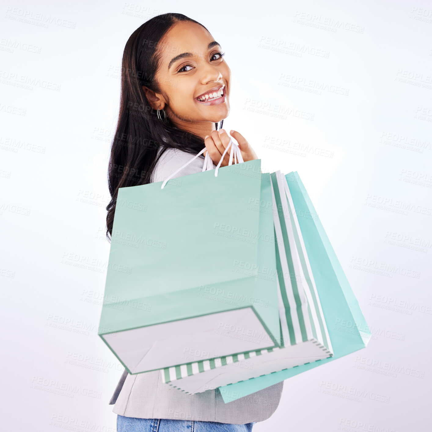 Buy stock photo Portrait, woman and bag of shopping in studio, white background and fashion deal in retail package. Happy female customer, gift bags and luxury present from mall, discount market and sales promotion