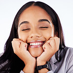 Excited, smile and shy woman with hands on face in studio for news, sale or self love promo on white background. Happy, winner and female customer with coming soon announcement, deal or sign up info