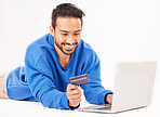 Studio laptop, credit card and happy man online shopping for tech discount, promotion or e commerce sales. Customer payment, trading store and relax financial banking person on white background floor