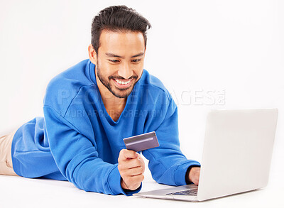 Buy stock photo Studio laptop, credit card and happy man online shopping for tech discount, promotion or e commerce sales. Customer payment, trading store and relax financial banking person on white background floor