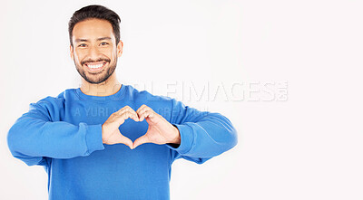 Buy stock photo Portrait, heart and hands of man in studio, white background and care for kindness on mockup space. Happy asian male model with finger shape for love icon, thank you and emoji in support of freedom