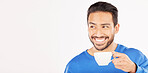 Happy asian man, coffee and thinking on mockup space for morning drink against a white studio background. Male person smile in dream, idea or wonder with tea cup or hot beverage for breakfast start