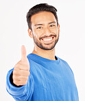 Thumbs up, portrait and asian man in support, success and winning news in studio. Face of happy model, thumb emoji and like of feedback, good review or vote in agreement of winner on white background