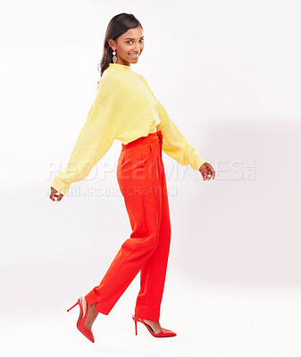 Indian woman in studio, fashion portrait of pose style with arms