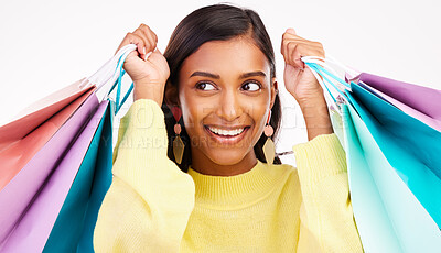 Buy stock photo Fashion, shopping bag and promotion with face of woman in studio for product, boutique and deal. Giveaway, luxury and retail with female customer on white background for mall, commercial or store