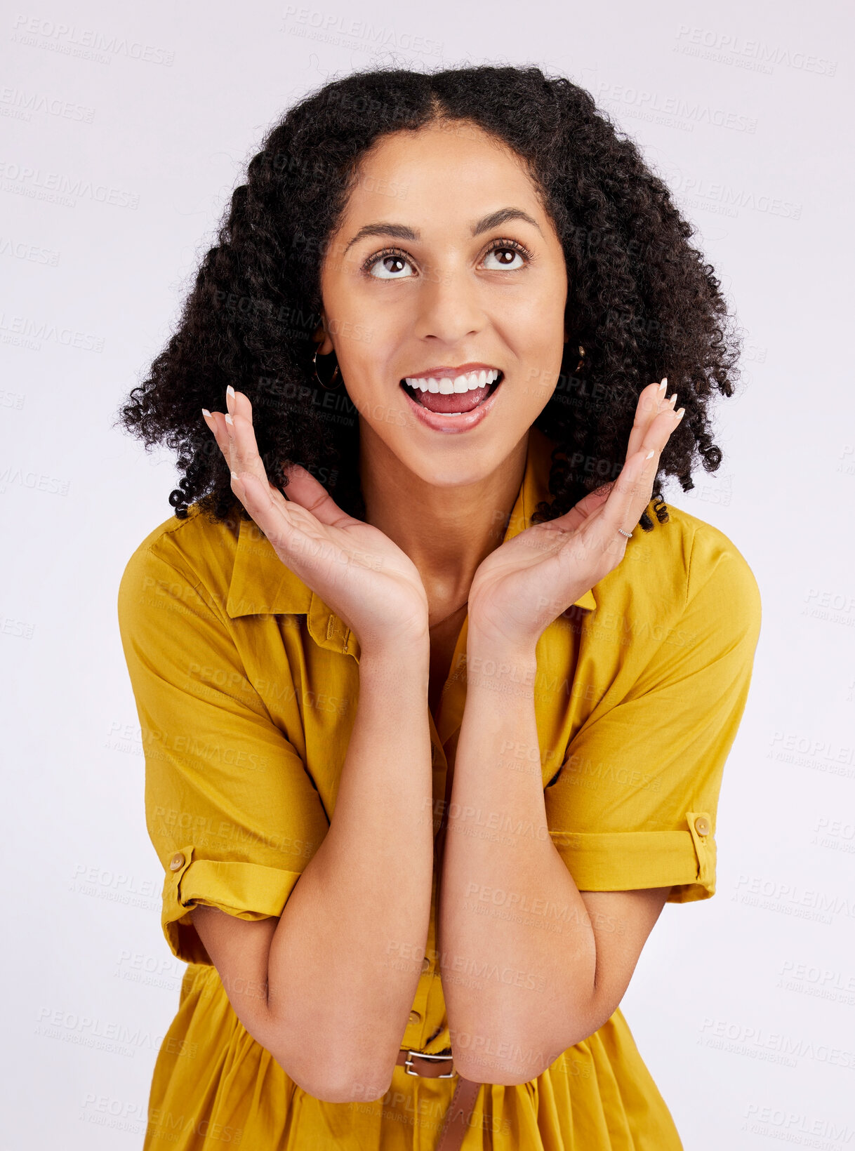 Buy stock photo Wow, surprise and hands on face of woman in studio looking up for info, promo or news on white background. Omg, announcement and female with emoji expression to gossip, secret or unexpected wtf drama