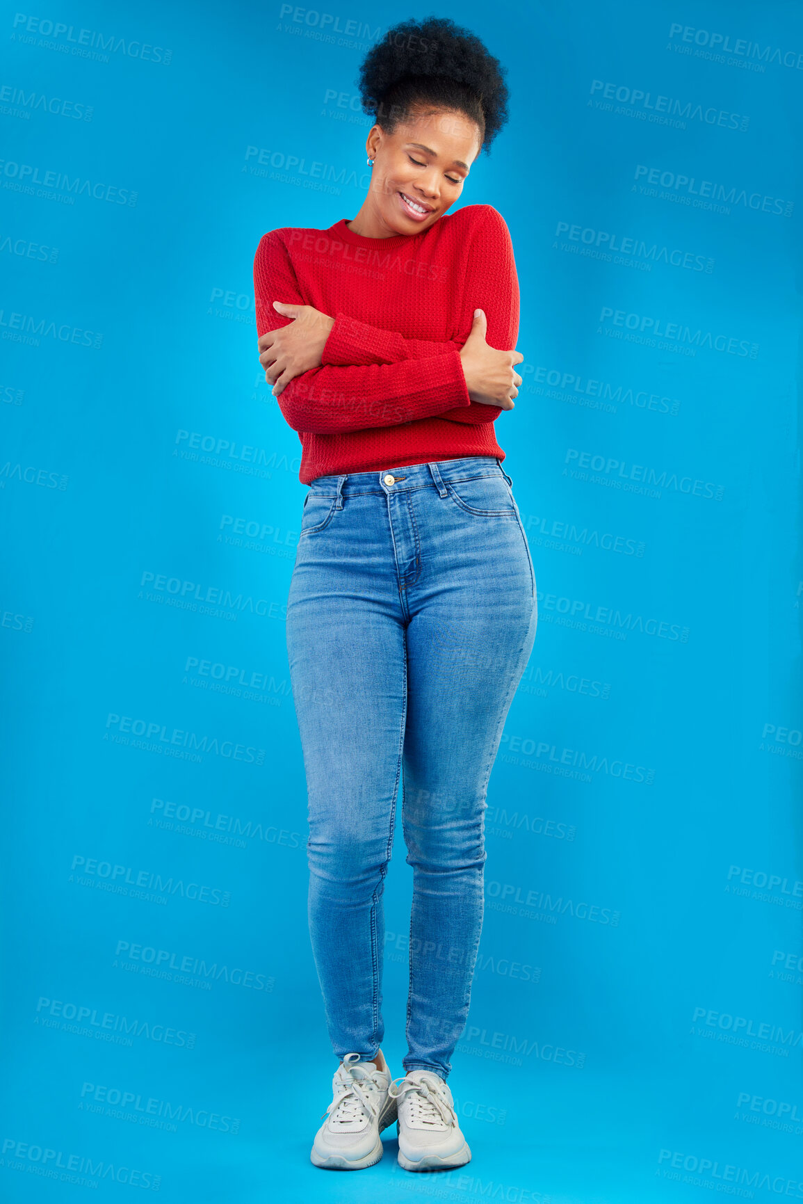 Buy stock photo Fashion, smile and portrait of a woman with comfort and confident isolated in a studio blue background. Casual, calm and full body of a happy young female person with stylish or trendy clothes