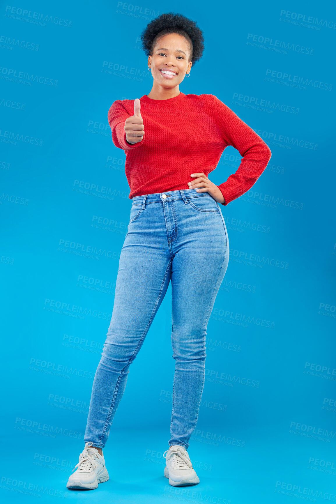 Buy stock photo Happy woman, portrait and thumbs up for approval, winning or success against a blue studio background. Female person smile in casual fashion with like emoji, yes sign or OK for agreement or thank you