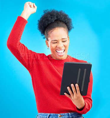 Buy stock photo Happy woman, tablet and fist pump for winning, discount or sale against a blue studio background. Excited female person in celebration with technology for good news, bonus promotion or lottery prize