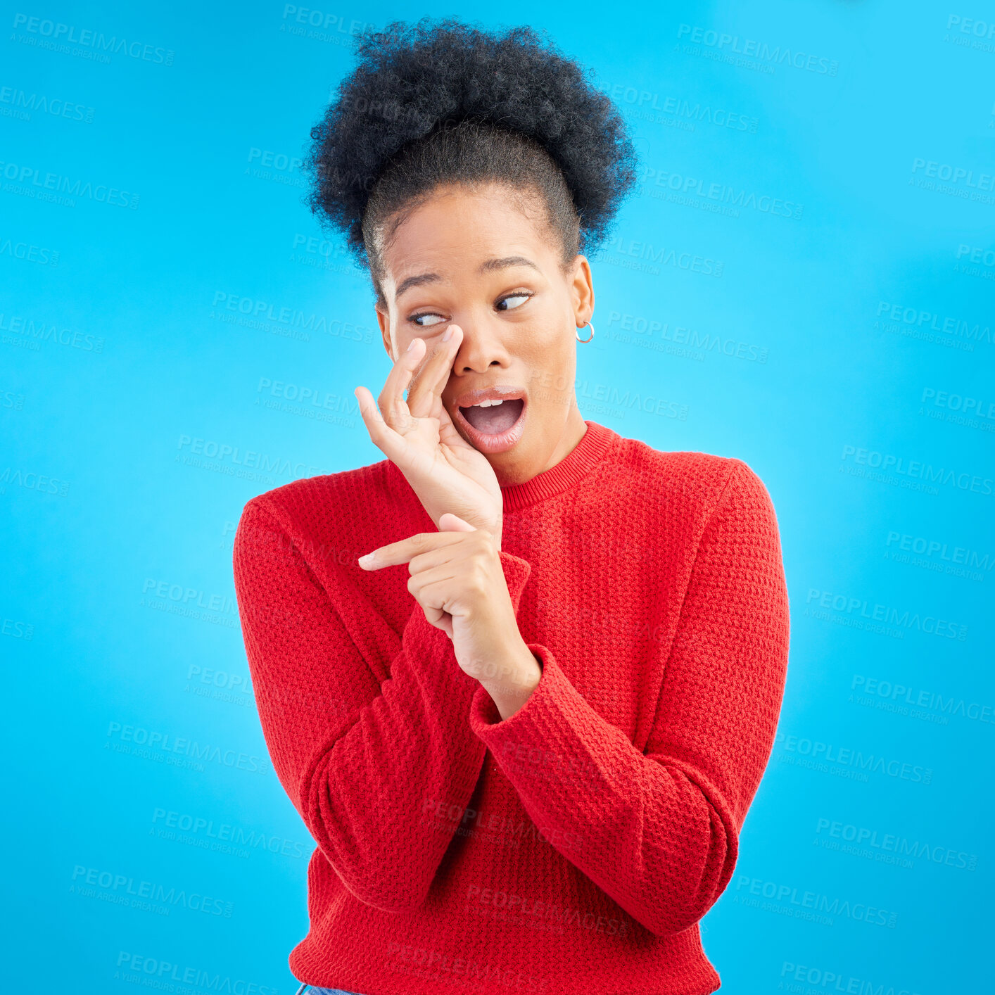 Buy stock photo Secret, gossip and black woman in studio pointing isolated on a blue background. Happy, whisper and African person with deal, promotion or news for offer, privacy and announcement of info on mockup