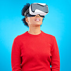 VR, metaverse and digital glasses with woman watching a video with augmented reality. Studio, female person and blue background with future technology and online web user with 3d virtual network 