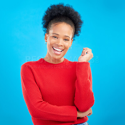 Buy stock photo Studio, portrait and happy black woman with natural beauty and confidence with afro hairstyle and casual fashion. Smile, African girl and laughing with a mindset of happiness on blue background