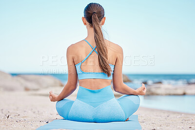 Buy stock photo Yoga, meditation and back view of woman at the beach for workout or training as health, mindfulness and wellness routine. Healthy, body and person exercise a chakra by doing lotus pose at sea