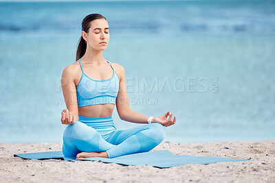 Buy stock photo Meditation, yoga and woman by beach for wellness, healthy body and zen energy by ocean for calm. Mindfulness, nature and female person with crossed legs for balance, training and meditate by sea