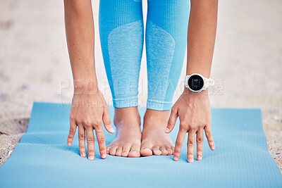 Buy stock photo Hands, feet and yoga with a person at the beach for fitness, wellness or health outdoor in the fresh air. Exercise, nature and relax with legs stretching on a mat for pilates training or workout