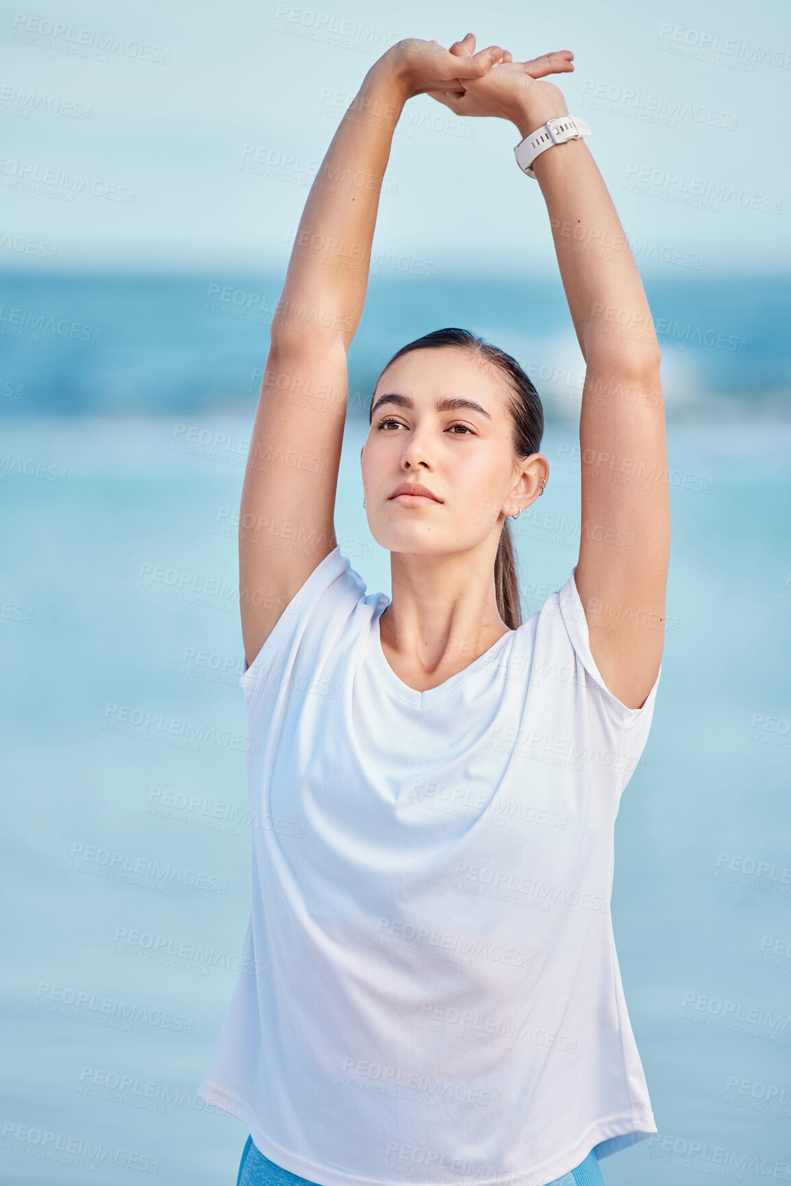 Buy stock photo Woman, beach and stretching body in yoga for fitness, exercise or spiritual wellness in outdoor workout. Female person, yogi or runner in warm up on ocean coast for sports, zen or meditation outside