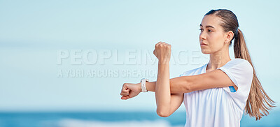 Buy stock photo Woman, arm and stretching by beach on mockup space in fitness, motivation or outdoor workout. Female person or runner in body warm up on ocean coast, banner or sports for healthy wellness or training