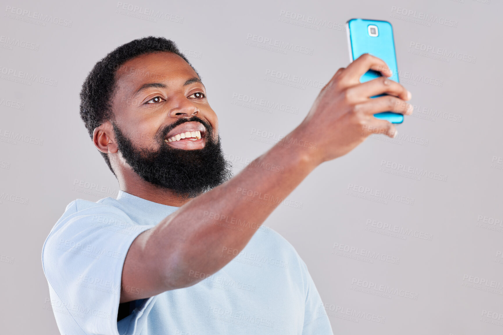 Buy stock photo Happy black man, selfie and photography for social media, vlog or networking against a grey studio background. African male person smile for photo, memory or online communication and picture post